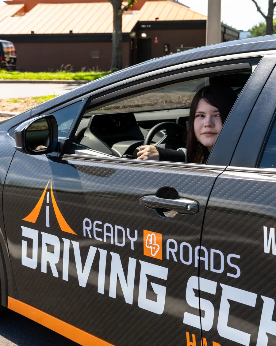 Student at the wheel of the lesson car