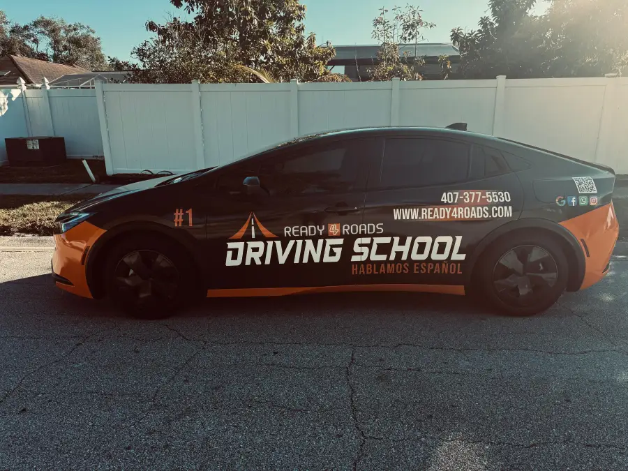 Ready 4 Roads lesson car with the school's wrap